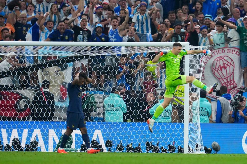 Martinez celebrates after saving a shootout penalty (AP)