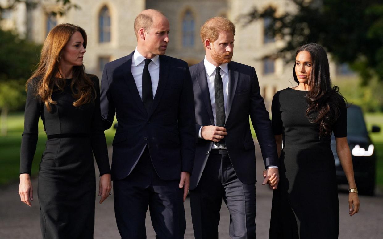 Britain's Catherine, Princess of Wales, Britain's Prince William, Prince of Wales, Britain's Prince Harry, Duke of Sussex, and Meghan, Duchess of Sussex on the long Walk at Windsor Castle on September 10, 2022, before meeting well-wishers - Kirsty O'Connor/AFP