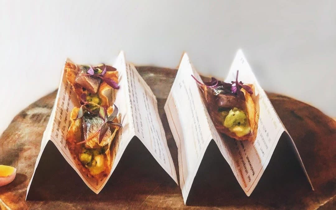 Native restaurant made tacos out of fish scraps and served them on old menus - Native