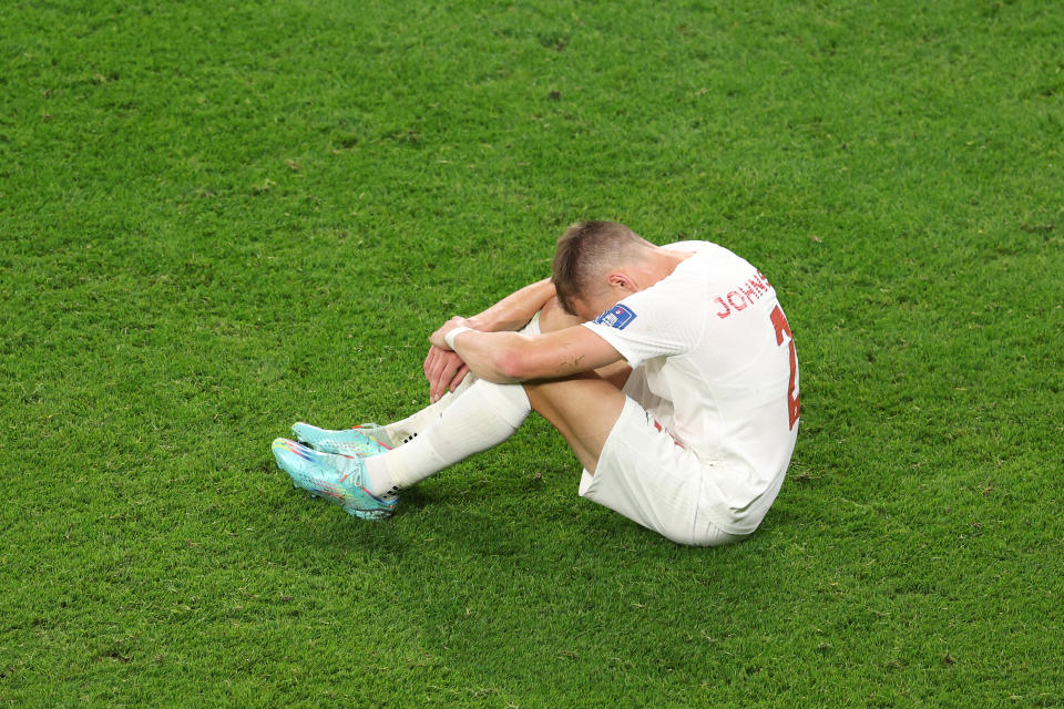 DOHA, QATAR - NOVEMBER 23: Alistair Johnston of Canada shows dejection after the 0-1 defeat in the FIFA World Cup Qatar 2022 Group F match between Belgium and Canada at Ahmad Bin Ali Stadium on November 23, 2022 in Doha, Qatar. (Photo by Richard Heathcote/Getty Images)