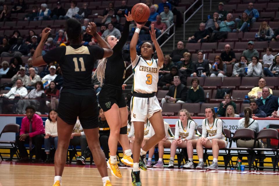 Lansdale Catholic freshman Sanyiah Littlejohn shoots under pressure at Giant Center in Hershey on Thursday, March 24, 2022. Archbishop Wood defeated Lansdale Catholic in PIAA title game in class 4A. 