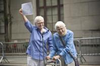 Phyllis Sifel (L) and Connie Kopelov celebrate after being married at the marriage bureau in lower Manhattan July 24, 2011.