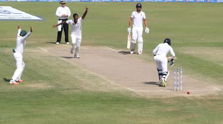 Pakistan's Rahat Ali celebrates the wicket of England's Adil Rashid . Action Images via Reuters / Jason O'Brien Livepic