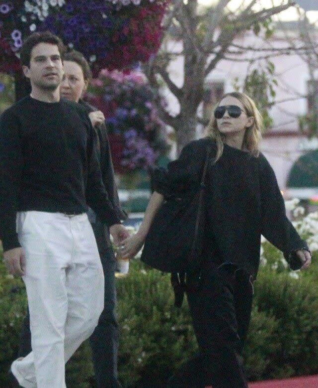 The 33-year-old twin was photographed with her boyfriend, artist Louis Eisner, during an evening out in California.