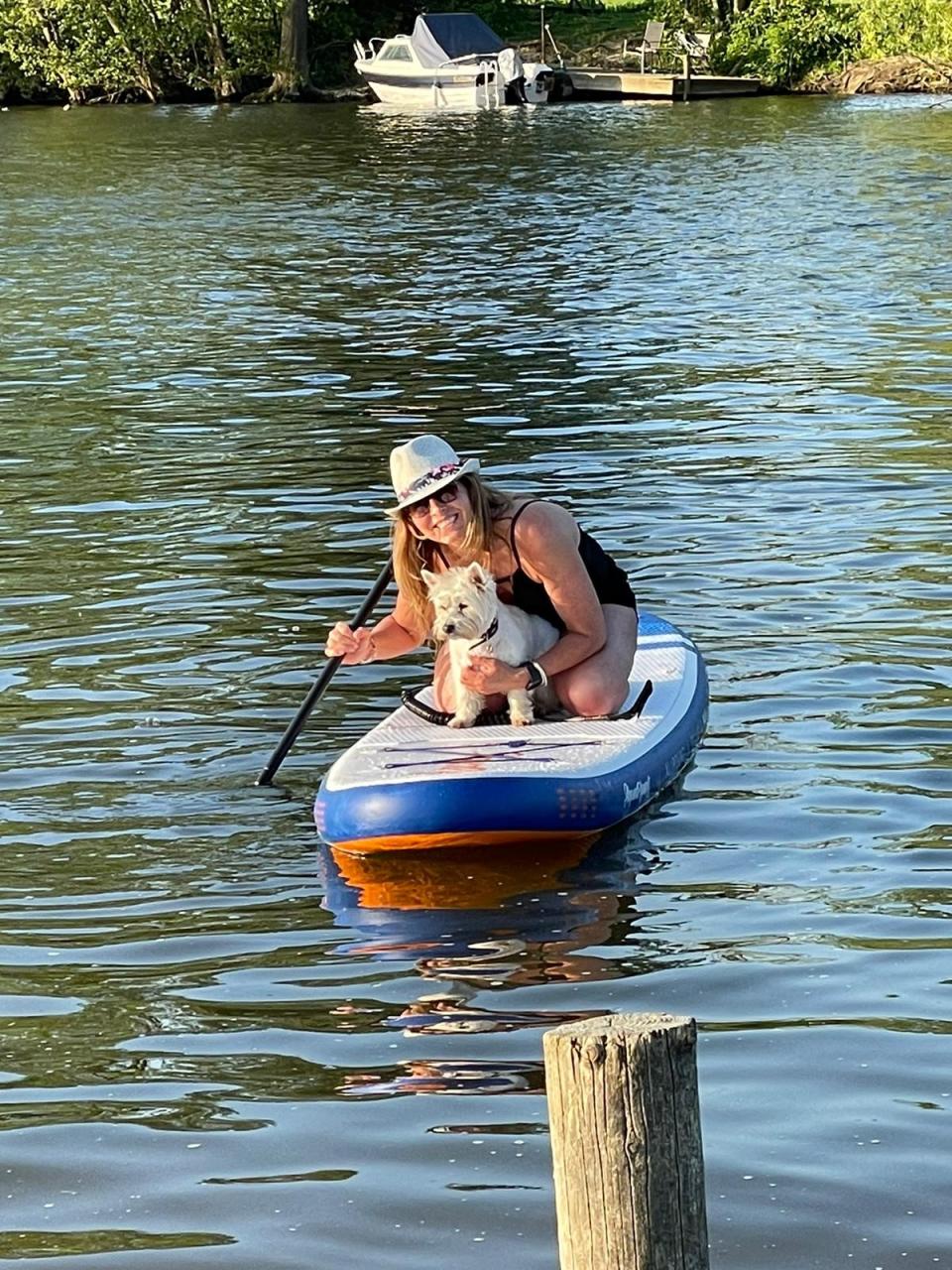 Charlie and Emma paddleboarding