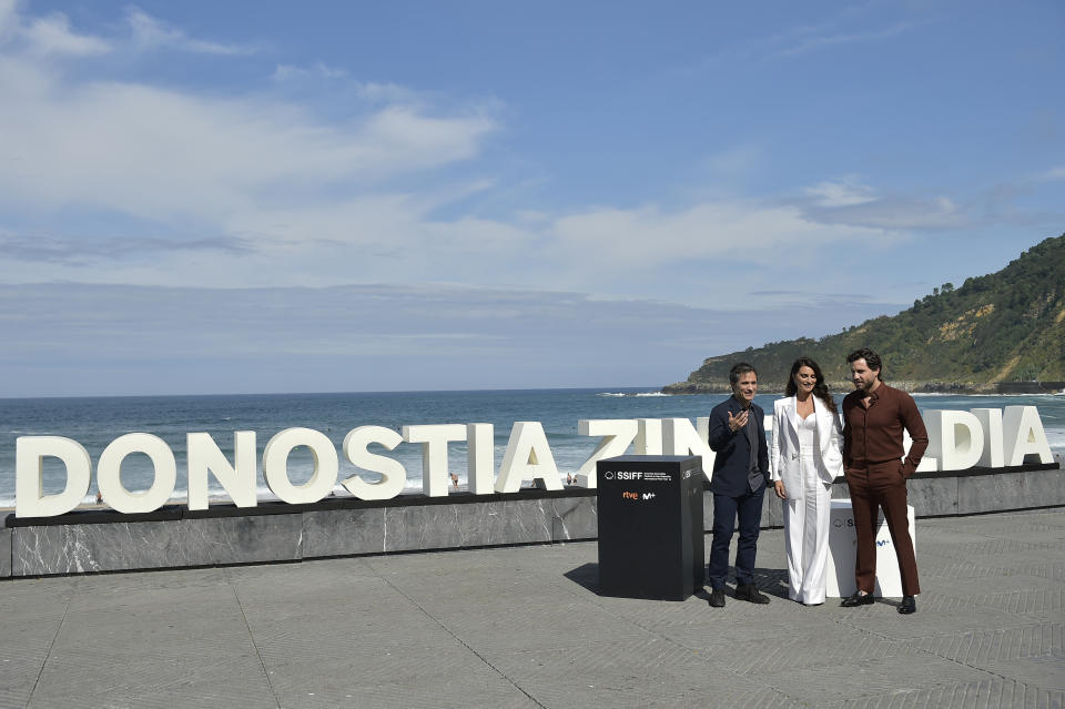 Actors Gael Garcia Bernal, from left, Penelope Cruz and Edgar Ramirez pose for photographers at the photo call for the film 'Wasp Network' at the 67th San Sebastian Film Festival, in San Sebastian, northern Spain Friday, Sept. 27, 2019. (AP Photo/Alvaro Barrientos)