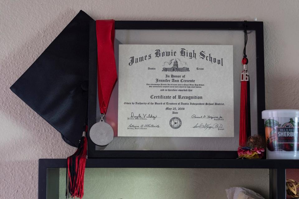 A certificate recognizing Jennifer Crecente for her high school achievements hangs in her mother's home.