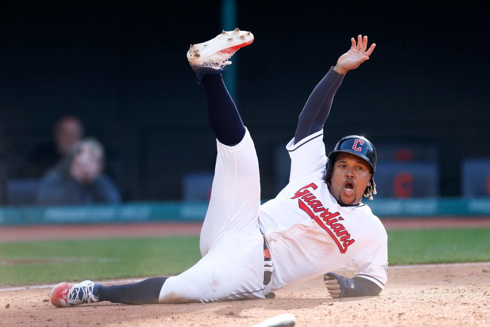 Guardians third baseman Jose Ramirez celebrates after scoring the winning run on a fielder choice by Josh Bell during the 12th inning against the Mariners, Sunday, April 9, 2023, in Cleveland.
