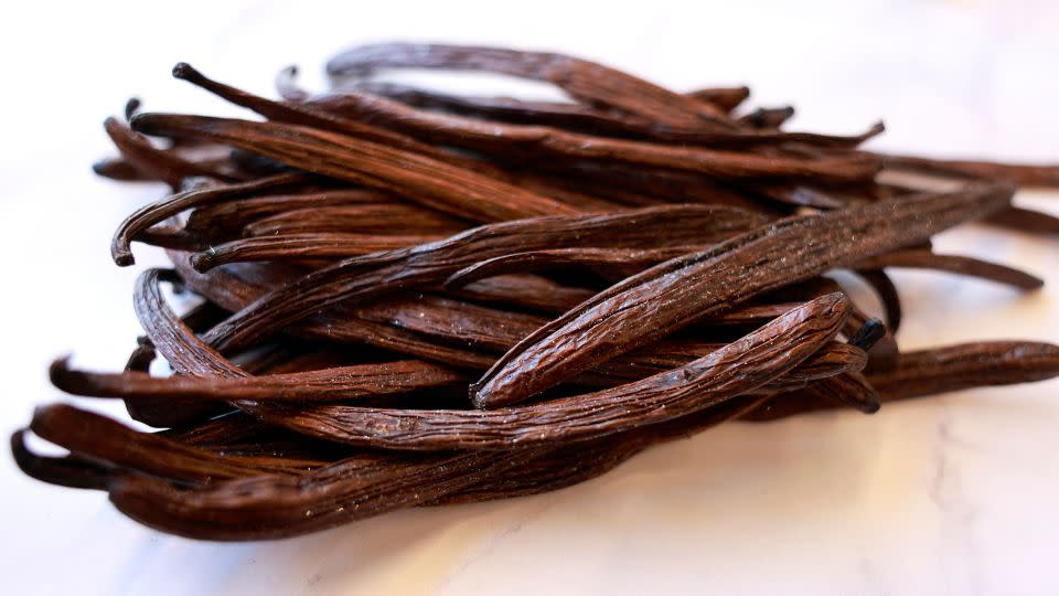 These thin fingers of vanilla beans are the subject of one chapter in "Bite by Bite," which contextualizes the history of the spice and meditates on boyhood. - Menahem Kahana/AFP/Getty Images