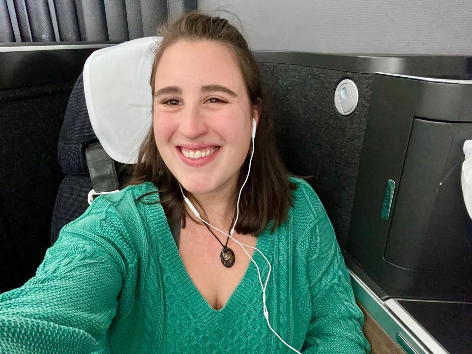 A selfie of the author in a green sweater in the Club Suite.