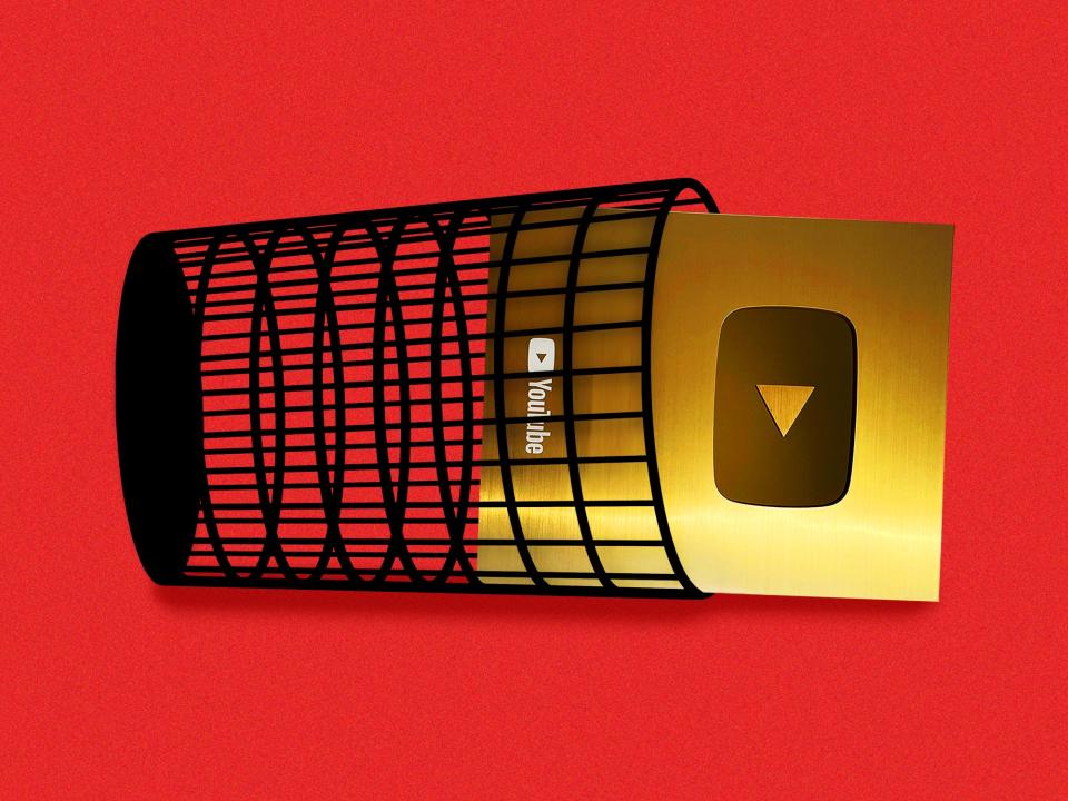 A gold Youtube subscriber plaque lies inside a knocked-over wire trash can.