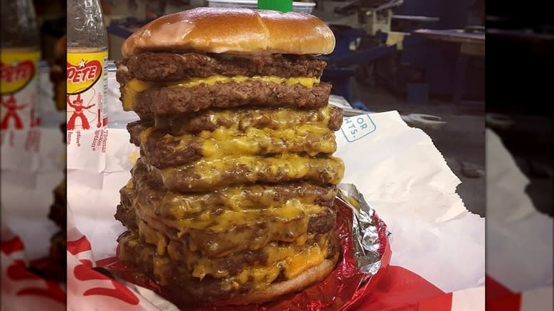 Nine-pattied T-Rex burger unwrapped