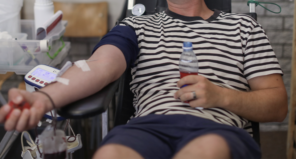 A generic image of a man giving blood. 