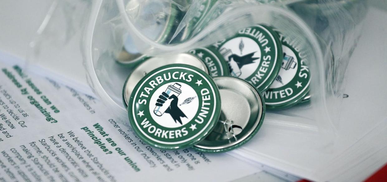 More than 400 Starbucks shops have voted to join a union so far. <a href="https://newsroom.ap.org/detail/StarbucksStoreClosure/a23e635d3bf24887adcc025cbdfd9a39/photo?Query=starbucks%20union&mediaType=photo,video,graphic,audio&sortBy=arrivaldatetime:desc&dateRange=Anytime&totalCount=190&currentItemNo=114" rel="nofollow noopener" target="_blank" data-ylk="slk:AP Photo/Joshua Bessex;elm:context_link;itc:0;sec:content-canvas" class="link ">AP Photo/Joshua Bessex</a>