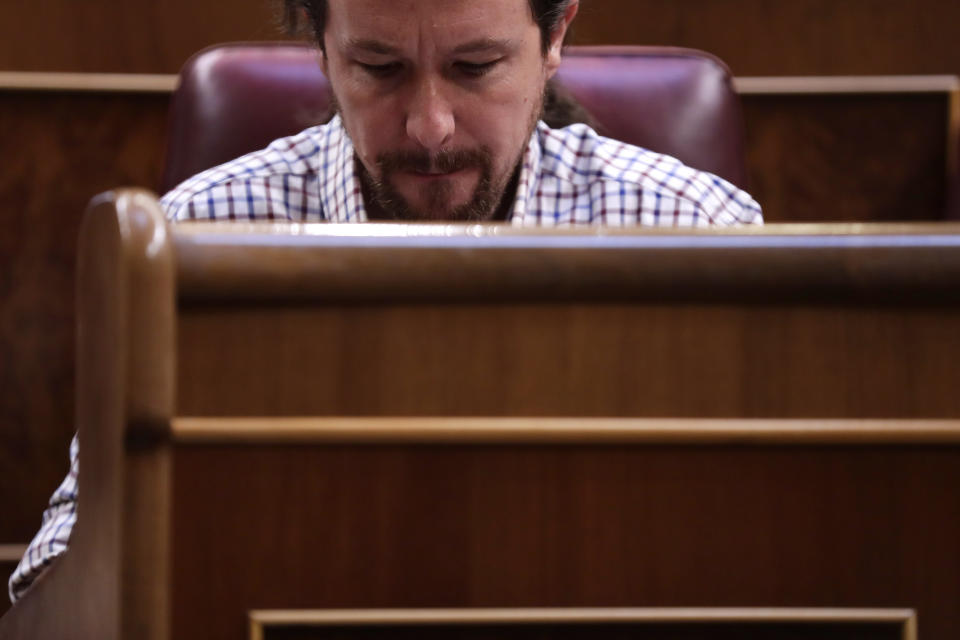 Unidos Podemos (United We Can) party leader Pablo Iglesias arrives at the Spanish parliament in Madrid, Spain, Thursday, July 25, 2019. Caretaker Prime Minister Pedro Sánchez faces his second chance to win the endorsement of the Spanish Parliament to form a government this week. (AP Photo/Manu Fernandez)