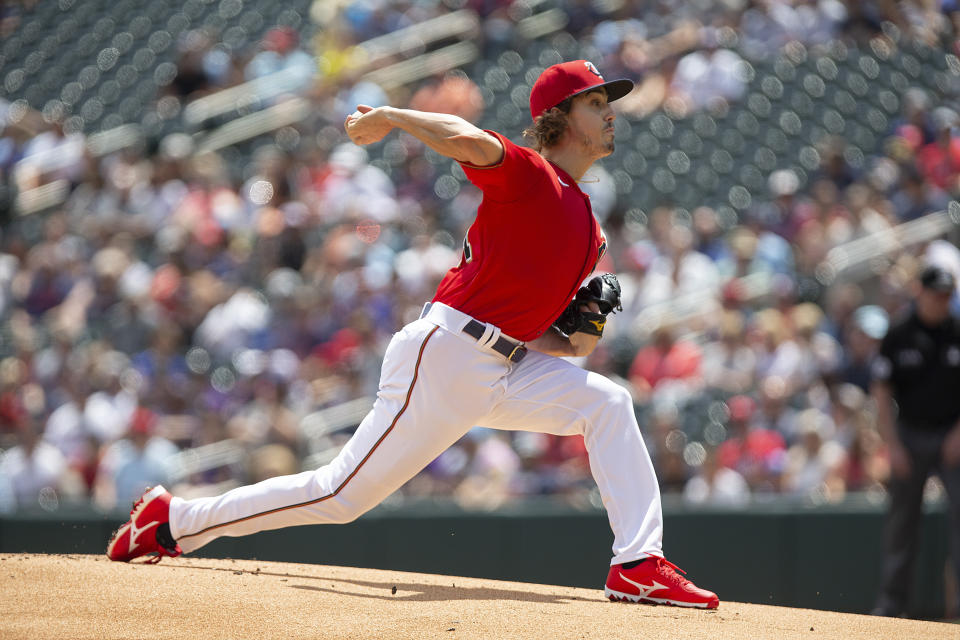 Minnesota Twins starting pitcher Joe Ryan throws against the Colorado Rockies in the first inning of a baseball game Sunday, June 26, 2022, in Minneapolis. (AP Photo/Andy Clayton-King)