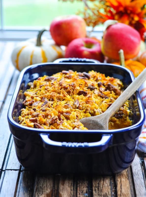 <p>The Seasoned Mom</p><p>The layered make-ahead side dish has been a family favorite for over 40 years, and it’s the perfect addition to your Thanksgiving or Christmas table!</p><p><strong>Get the recipe:</strong> <a href="https://www.theseasonedmom.com/apple-butternut-squash-casserole/" rel="nofollow noopener" target="_blank" data-ylk="slk:Apple and Butternut Squash Casserole;elm:context_link;itc:0;sec:content-canvas" class="link "><strong>Apple and Butternut Squash Casserole</strong></a></p>