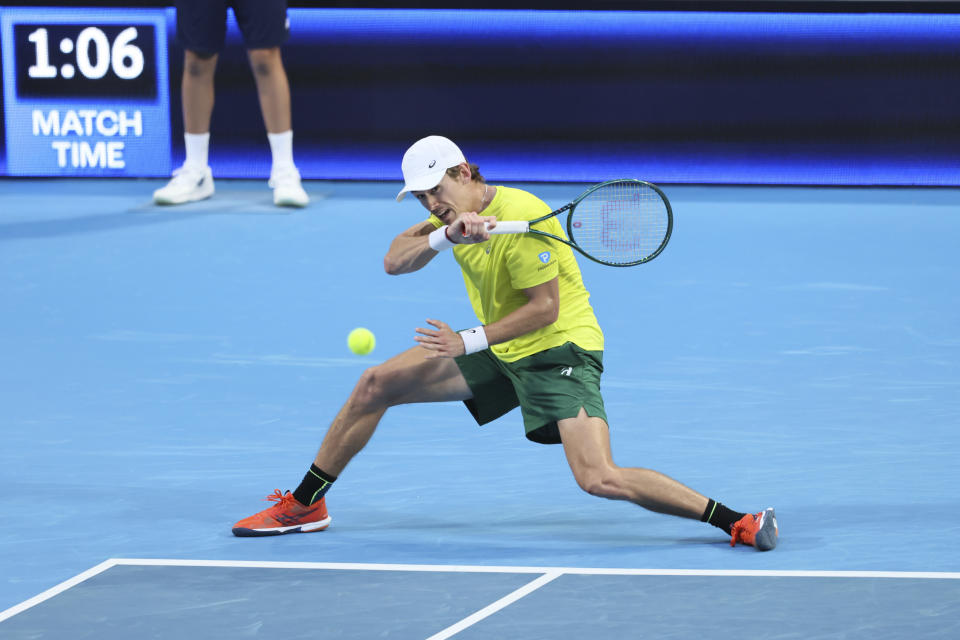 Alex de Minaur of Australia plays a shot during his match against Cameron Norrie of Britain during the United Cup tennis tournament in Perth, Australia, Friday, Dec. 29, 2023. (AP Photo/Trevor Collens)