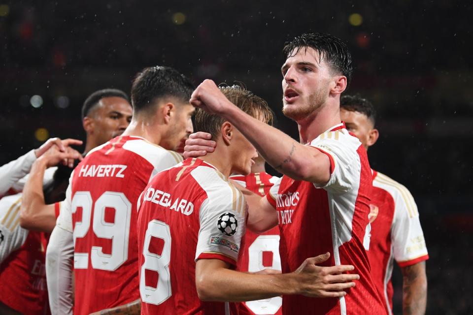 Declan Rice celebrating with Arsenal teammates (Arsenal FC via Getty Images)