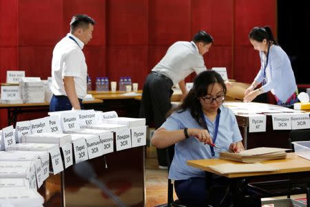 Election officials count votes in the presidential election in Ulaanbaatar, Mongolia, June 26, 2017. REUTERS/B. Rentsendorj