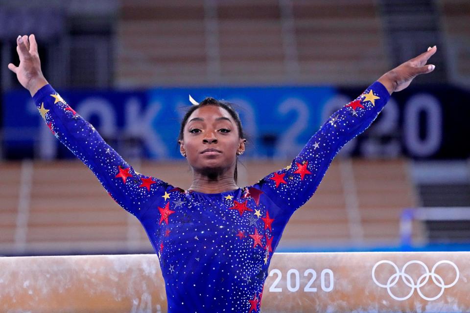 Jul 25, 2021; Tokyo, Japan; Simone Biles (USA) competes on the balance beam in the womens gymnastics qualifications during the Tokyo 2020 Olympic Summer Games at Ariake Gymnastics Centre. Mandatory Credit: Robert Deutsch-USA TODAY Network