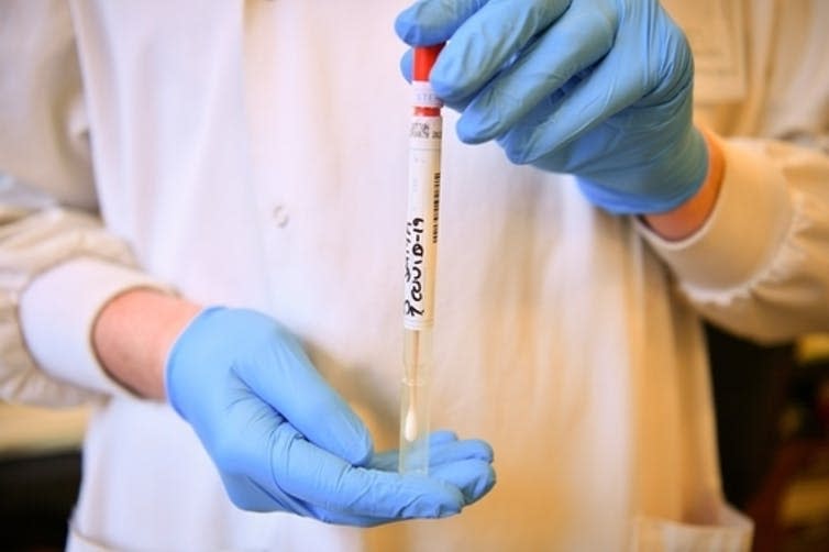 <span class="caption">Swab in a sealed sterile tube.</span> <span class="attribution"><span class="source">Ben Birchall/PA Wire/PA Images</span></span>