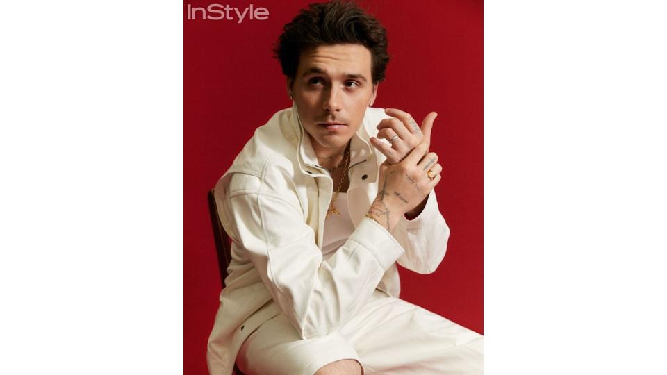 brooklyn beckham in white outfit 