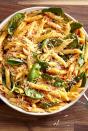 <p>This deliciously savoury red pesto will make you never want to go green again.</p><p>Get the <a href="https://www.delish.com/uk/cooking/recipes/a35706648/roasted-red-pepper-pesto-penne-recipe/" rel="nofollow noopener" target="_blank" data-ylk="slk:Roasted Red Pepper Pesto Penne;elm:context_link;itc:0;sec:content-canvas" class="link ">Roasted Red Pepper Pesto Penne</a> recipe. </p>