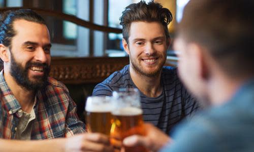 Men drinking in a pub