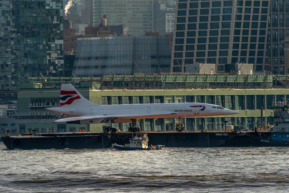 The retired British Airways Concorde supersonic airliner is moved on a barge up the Hudson River on March 14, 2024 seen from Hoboken, New Jersey.