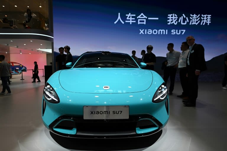 The consumer tech giant is the latest entrant to China's cut-throat EV market, with its new SU7 model the star of the show (Jade Gao)
