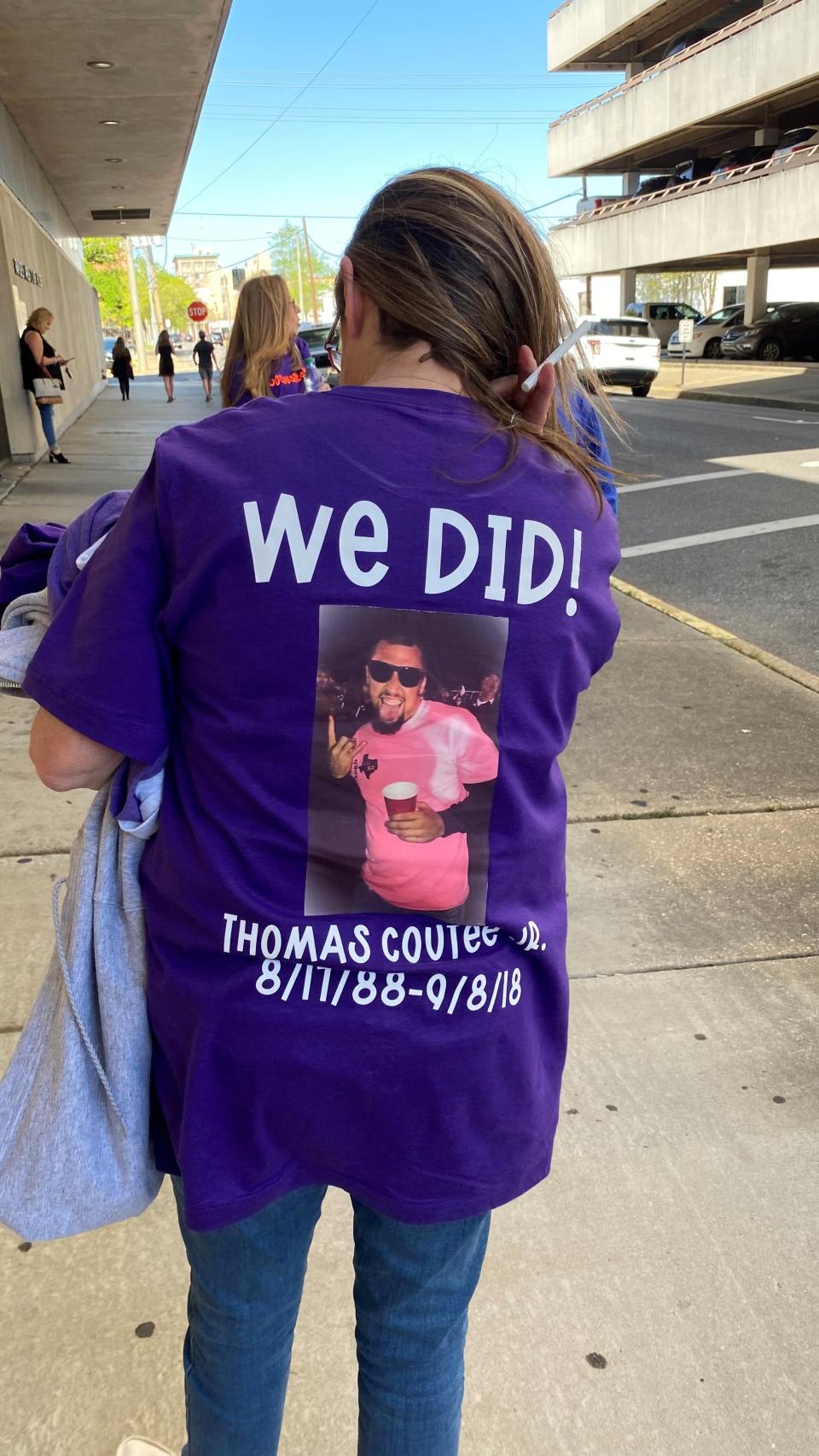 Cathy Pearson, the mother of Thomas Coutee Jr., shows off the back of the T-shirt she wore to the sentencing for Kayla Giles, who was convicted in her son's Sept. 8, 2018, shooting death. The front of the shirt reads, "Got justice 4 T?"