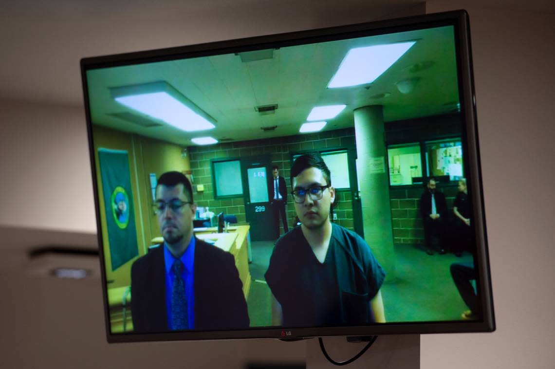 Rigoberto Galvan, 22, of Burlington, right, appears with defense attorney Adrian Madrone in Whatcom County Superior Court in Bellingham Aug. 14, 2019. He was arrested earlier in the day for suspicion of first-degree murder. He allegedly climbed into an apartment through a window and shot a female victim. His trial started Monday, Aug. 29.