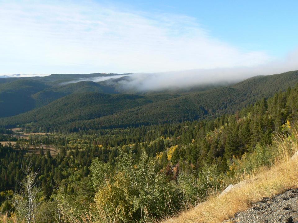 This undated photo provided by the Helena Convention and Visitors Bureau shows MacDonald Pass, which offers more than 10 miles of trails in the backcountry of the Continental Divide just 15 miles west of Helena, Mont. The area attracts cross-country skiers in winter but can be hiked in other seasons. It’s one of a number of free things to see and do in the Helena area, which is about halfway between Glacier and Yellowstone national parks. (AP Photo/Helena CVB, Mike Mergenthaler)