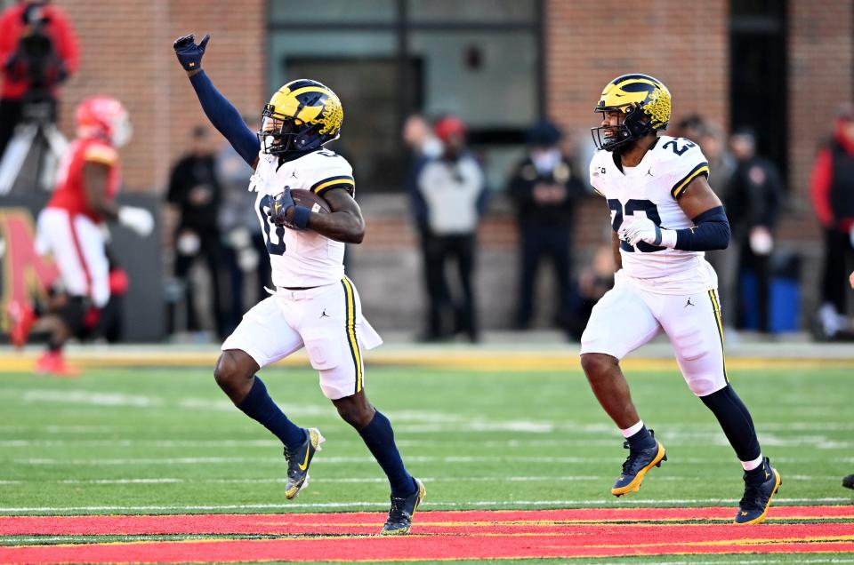 Michigan's Mike Sainristil celebrates after making an interception in the fourth quarter against Maryland at SECU Stadium on Nov. 18, 2023 in College Park, Maryland.