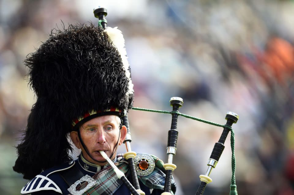 A royal piper plays outside of the Queen's bedroom window each morning. Photo: Getty