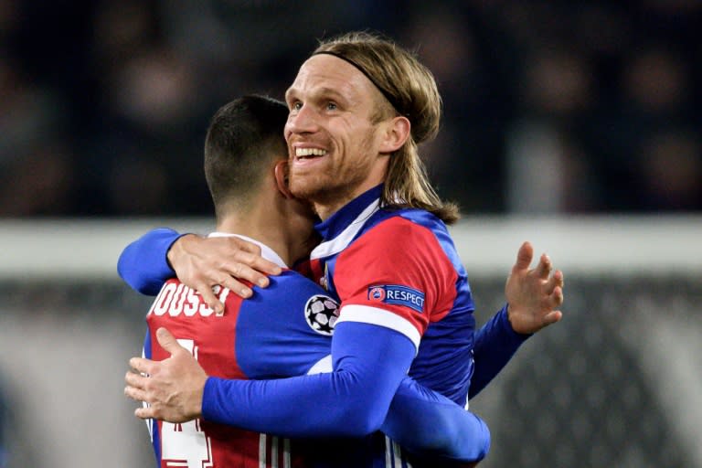 Basel's defender Michael Lang (R), who scored the only goal of the game, reacts at the end of the UEFA Champions League Group A football match against Manchester United November 22, 2017