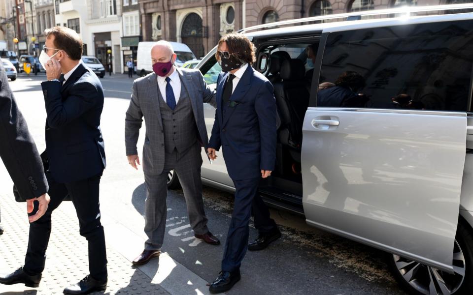 Hollywood actor Johnny Depp, wearing a face mask or covering due to the Covid-19 pandemic - Anadolu