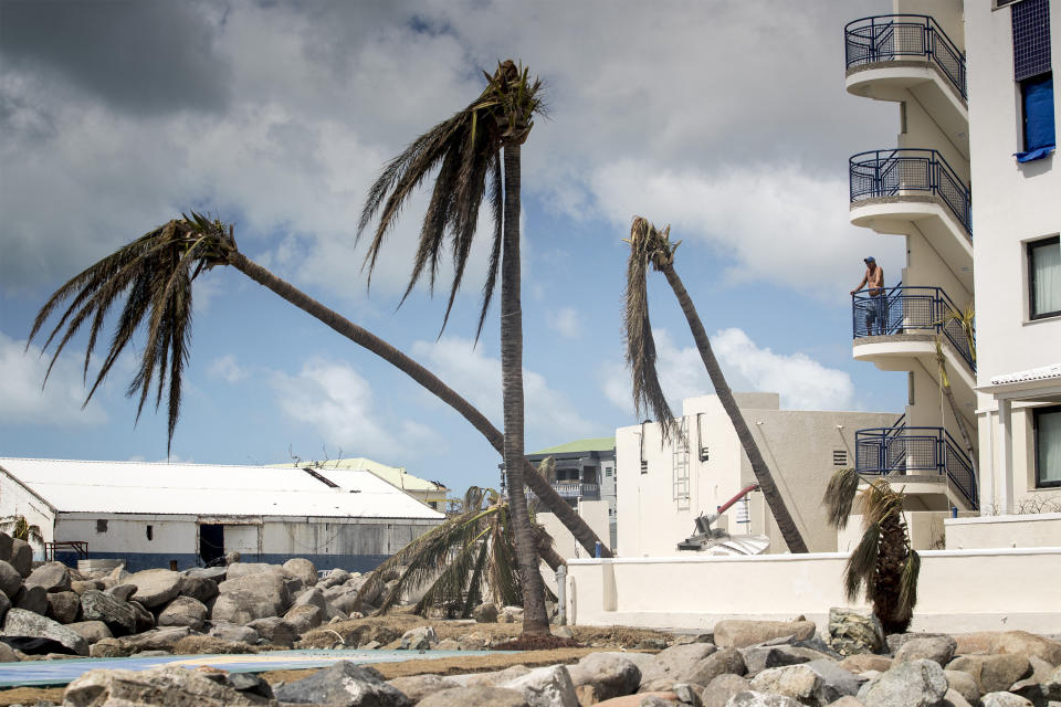 A man looks on over the devastation of Hurricane Irma in Sint Maarten.