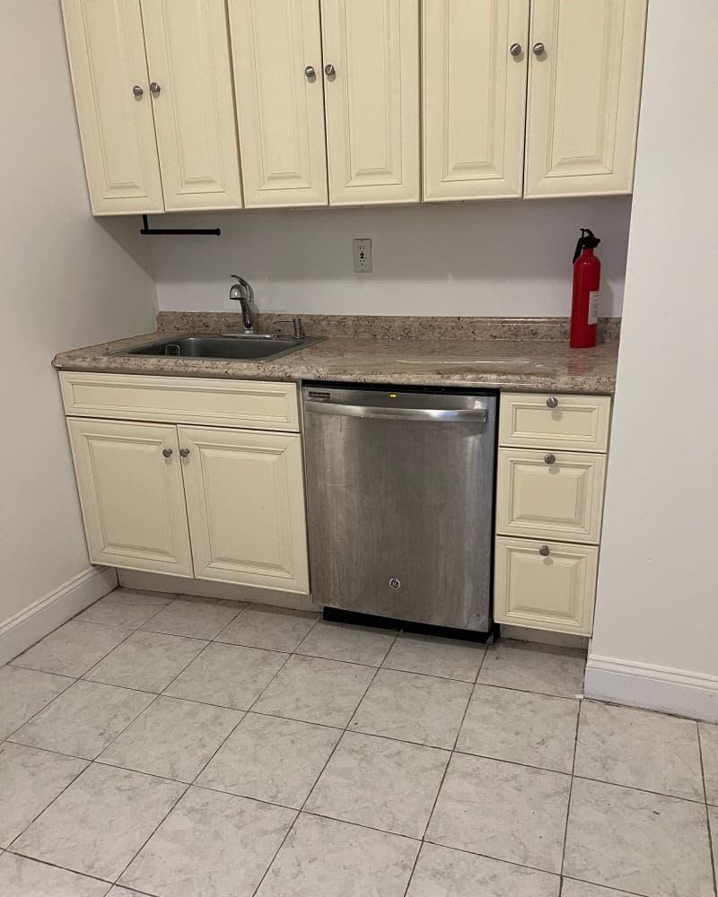 Kitchen sink area before renovation.