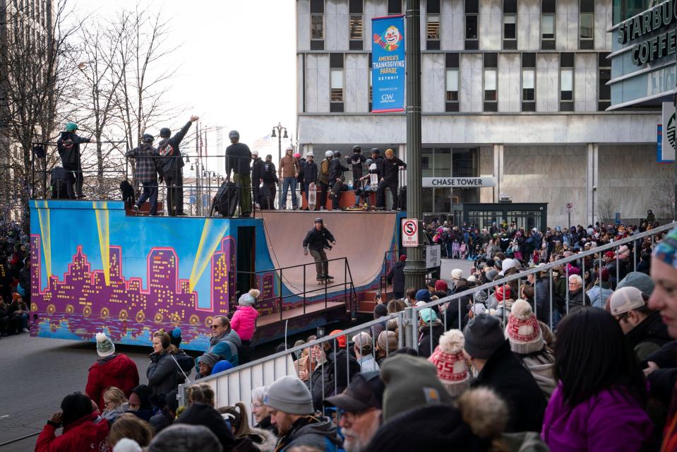 Parade participants with Modern Skate & Surf perform skate stunts on a float during the 96th America’s Thanksgiving Parade along Woodward Avenue in downtown Detroit on Thursday, Nov. 24, 2022.