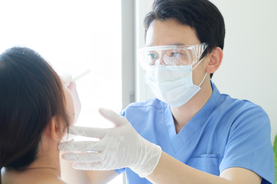 asian doctor medical examination at the hospital