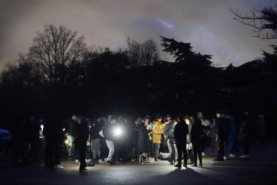 People at a vigil for murdered teenager Harry Pitman (PA)