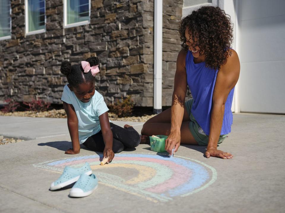 <p>Play tic-tac-toe or draw colorful pictures on the sidewalk—and if your masterpiece disappears too soon, <em>chalk</em> it up to Mother Nature. (Ha!) Rain may wash it away, but you'll always have the joyful memories.</p>