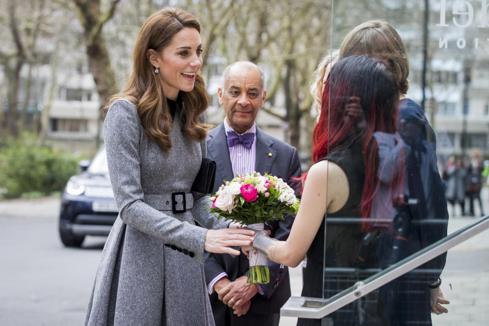 Kate receives flowers as she arrives at the Foundling Museum in London [Photo: Getty]