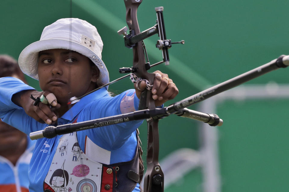 India's Deepika Kumari releases her arrow during an elimination round of the individual archery competition at the Sambadrome venue during the 2016 Summer Olympics in Rio de Janeiro, Brazil, Thursday, Aug. 11, 2016. (AP Photo/Alessandra Tarantino)