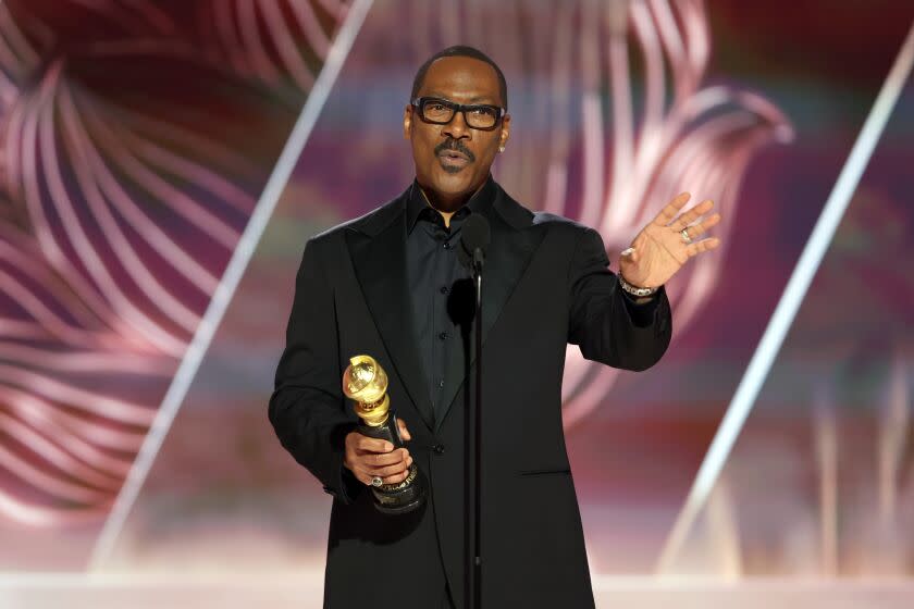 BEVERLY HILLS, CALIFORNIA - JANUARY 10: 80th Annual GOLDEN GLOBE AWARDS -- Pictured: Honoree Eddie Murphy accepts the Cecil B. DeMille Award onstage at the 80th Annual Golden Globe Awards held at the Beverly Hilton Hotel on January 10, 2023 in Beverly Hills, California. -- (Photo by Rich Polk/NBC via Getty Images)