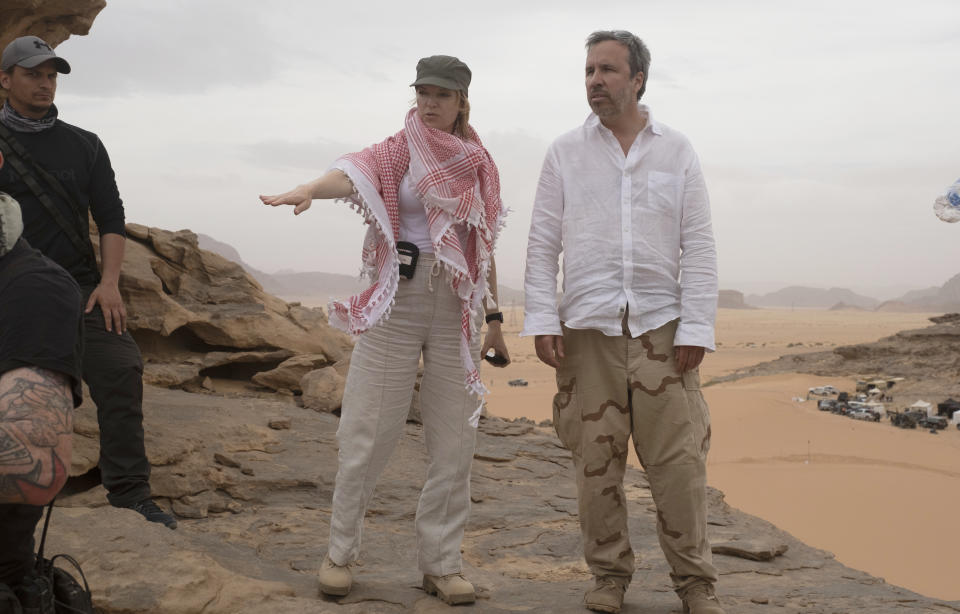 This image released by Warner Bros Pictures shows executive producer Tanya Lapointe with director Denis Villeneuve on the set of "Dune." (Chia Bella James/Warner Bros. via AP)