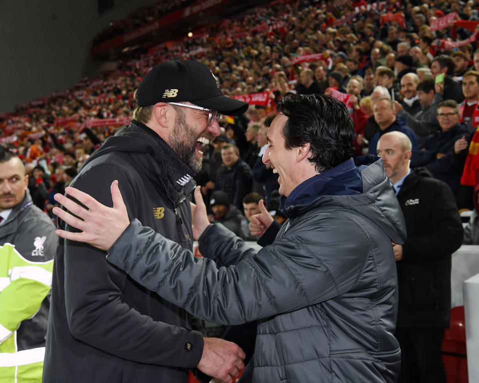 LIVERPOOL, ENGLAND - DECEMBER 29: (THE SUN OUT,THE SUN ON SUNDAY OUT) Jurgen Klopp Manager of Liverpool with Unai Emery the Manager of  Arsenal during the Premier League match between Liverpool FC and Arsenal FC at Anfield on December 29, 2018 in Liverpool, United Kingdom. (Photo by John Powell/Liverpool FC via Getty Images)