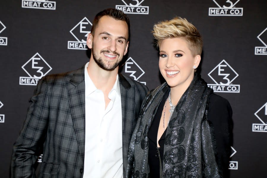 NASHVILLE, TENNESSEE – NOVEMBER 20: Nic Kerdiles (L) and Savannah Chrisley attend the grand opening of E3 Chophouse Nashville on November 20, 2019 in Nashville, Tennessee. (Photo by Danielle Del Valle/Getty Images for E3 Chophouse Nashville)